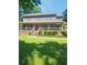 Charming two-story home featuring a cozy covered front porch at 4449 Inns Brook Dr, Snellville, GA 30039