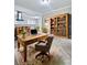 Dedicated home office with wood floors, built-in shelving and a comfortable layout at 4449 Inns Brook Dr, Snellville, GA 30039