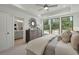 Bright bedroom with ensuite bathroom access and ample natural light at 1084 Battery Park Rd, Decatur, GA 30033