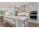 Spacious kitchen with a large center island, stainless steel appliances, and plenty of cabinet space at 1084 Battery Park Rd, Decatur, GA 30033