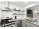 Kitchen with stainless steel appliances and granite countertops at 1225 Church St # O, Decatur, GA 30030