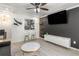 Modern living room features an open floor plan, stylish decor, and a pass-through view to the kitchen at 1225 Church St # O, Decatur, GA 30030