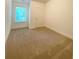 Bedroom with carpet and a window at 399 Auburn Valley Way, Auburn, GA 30011