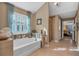 Luxurious bathroom with soaking tub and walk-in shower at 4504 Sterling Pointe Nw Dr, Kennesaw, GA 30152