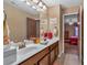 Double vanity bathroom with a view into a bedroom at 4504 Sterling Pointe Nw Dr, Kennesaw, GA 30152