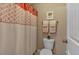 Clean bathroom with shower and patterned shower curtain at 4504 Sterling Pointe Nw Dr, Kennesaw, GA 30152