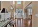 Two-story entryway with hardwood floors and lots of natural light at 4504 Sterling Pointe Nw Dr, Kennesaw, GA 30152