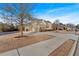 Two-story brick home with a three-car garage and landscaping at 4504 Sterling Pointe Nw Dr, Kennesaw, GA 30152