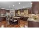 Gourmet kitchen boasts granite counters and stainless steel appliances at 4504 Sterling Pointe Nw Dr, Kennesaw, GA 30152