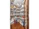 Large walk-in pantry with ample shelving for storage at 4504 Sterling Pointe Nw Dr, Kennesaw, GA 30152