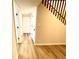 Basement hallway with vinyl flooring and multiple doors at 2535 Impala Dr, Cumming, GA 30041