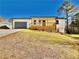 Newly built home with a covered porch at 2535 Impala Dr, Cumming, GA 30041