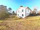 Rear view of house showing deck and yard at 2535 Impala Dr, Cumming, GA 30041