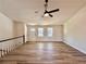 Bright living room with hardwood floors and ceiling fan at 2535 Impala Dr, Cumming, GA 30041