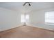 Bright bedroom with vaulted ceiling and carpet at 3103 Snapfinger Ln, Decatur, GA 30034