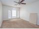 Bedroom with arched windows and ceiling fan at 3103 Snapfinger Ln, Decatur, GA 30034