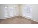 Bright room with neutral carpeting and multiple windows at 3103 Snapfinger Ln, Decatur, GA 30034