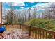 Wooden deck overlooks a wooded backyard at 3103 Snapfinger Ln, Decatur, GA 30034