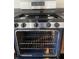 Clean stainless steel oven with four burners at 3103 Snapfinger Ln, Decatur, GA 30034