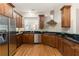 Updated kitchen featuring stainless steel appliances and hardwood floors at 3280 Stillhouse Se Ln # 109, Atlanta, GA 30339