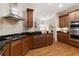 Gourmet kitchen with granite countertops and stainless steel appliances at 3280 Stillhouse Se Ln # 109, Atlanta, GA 30339