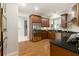 Modern kitchen with stainless steel appliances and dark wood cabinetry at 3280 Stillhouse Se Ln # 109, Atlanta, GA 30339