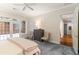 Main bedroom with access to the living room and a view of the backyard at 3280 Stillhouse Se Ln # 109, Atlanta, GA 30339