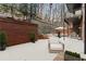 Large patio with seating area and stone retaining wall at 3280 Stillhouse Se Ln # 109, Atlanta, GA 30339