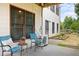 Cozy back patio with comfortable seating, creating a relaxing outdoor space to enjoy the garden views and fresh air at 416 Telfair Way, Canton, GA 30115