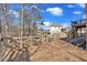 Spacious backyard featuring an tiered wooden deck overlooking the wooden fence at 416 Telfair Way, Canton, GA 30115