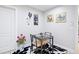 Breakfast nook features seating for four, rooster decor, and a black-and-white rug at 416 Telfair Way, Canton, GA 30115