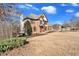 Charming exterior of a brick two-story home with a well-maintained lawn and mature landscaping at 416 Telfair Way, Canton, GA 30115