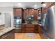 Beautiful kitchen featuring stainless steel appliances, double ovens and granite counters at 416 Telfair Way, Canton, GA 30115