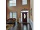 Two story foyer with hardwood floors and lots of natural light at 7413 Melhana Ln, Union City, GA 30291