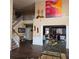 Open floor plan living area with staircase and hardwood floors at 7413 Melhana Ln, Union City, GA 30291