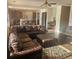 Open concept kitchen and living area with granite counters at 7413 Melhana Ln, Union City, GA 30291