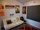 Home theater room with comfy seating and movie posters at 6053 Hemperly Rd, Atlanta, GA 30349