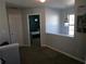 Upper hallway with carpet and access to bedrooms at 6053 Hemperly Rd, Atlanta, GA 30349