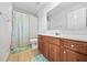 Bathroom with shower/tub combo, vanity, and tile floor at 4740 Eagles Ridge Loop, Stonecrest, GA 30038
