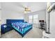 Bright bedroom with a large bed and ceiling fan at 4740 Eagles Ridge Loop, Stonecrest, GA 30038