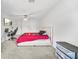 Main bedroom with a king-size bed, seating area, and a TV at 4740 Eagles Ridge Loop, Stonecrest, GA 30038