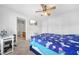 Bedroom with a queen bed, ceiling fan, and en-suite bathroom at 4740 Eagles Ridge Loop, Stonecrest, GA 30038
