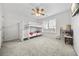 Bedroom with bunk beds, carpeted floor, and window at 4740 Eagles Ridge Loop, Stonecrest, GA 30038