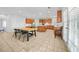 Eat-in kitchen with island, wood cabinets, and tile floors at 4740 Eagles Ridge Loop, Stonecrest, GA 30038