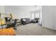 Home office featuring a desk, comfortable seating and large windows at 4740 Eagles Ridge Loop, Stonecrest, GA 30038