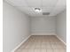 Empty room in basement with tile flooring at 730 Pinehurst Dr, Fairburn, GA 30213