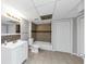 Clean basement bathroom with tub and vanity at 730 Pinehurst Dr, Fairburn, GA 30213