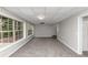 Bright finished basement featuring large windows and neutral walls at 730 Pinehurst Dr, Fairburn, GA 30213