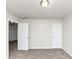 Spacious bedroom with neutral walls and carpet, offering ample closet space at 730 Pinehurst Dr, Fairburn, GA 30213