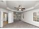 Large main bedroom with plush carpet and ample natural light at 730 Pinehurst Dr, Fairburn, GA 30213
